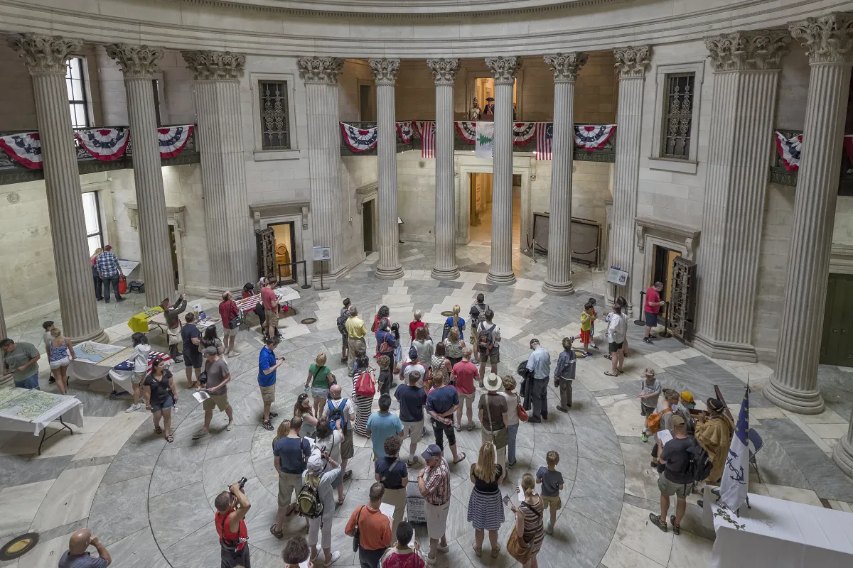 “Large crowd inside the rotunda of Federal Hall National Memorial”