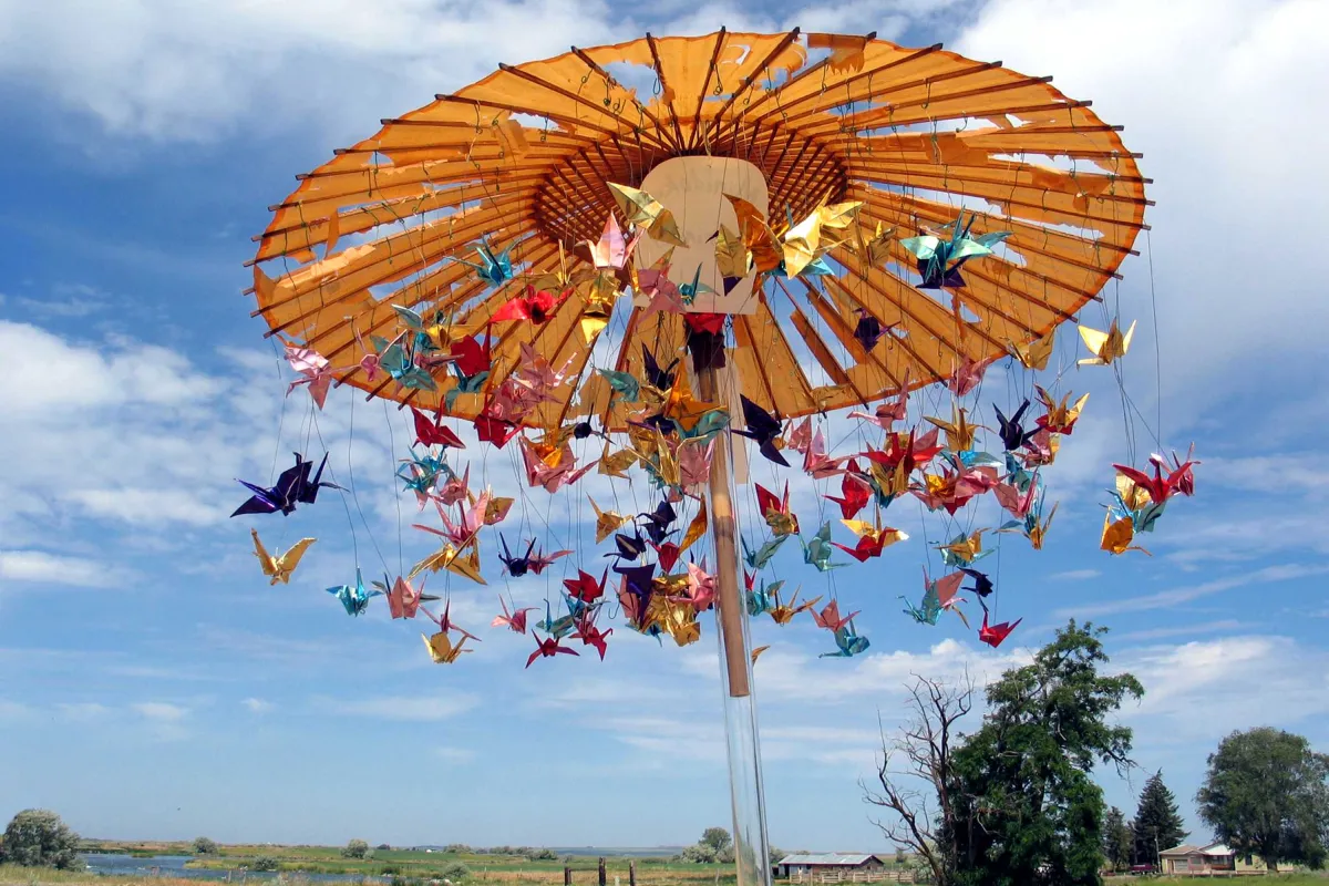 Origami cranes twirl on carousel