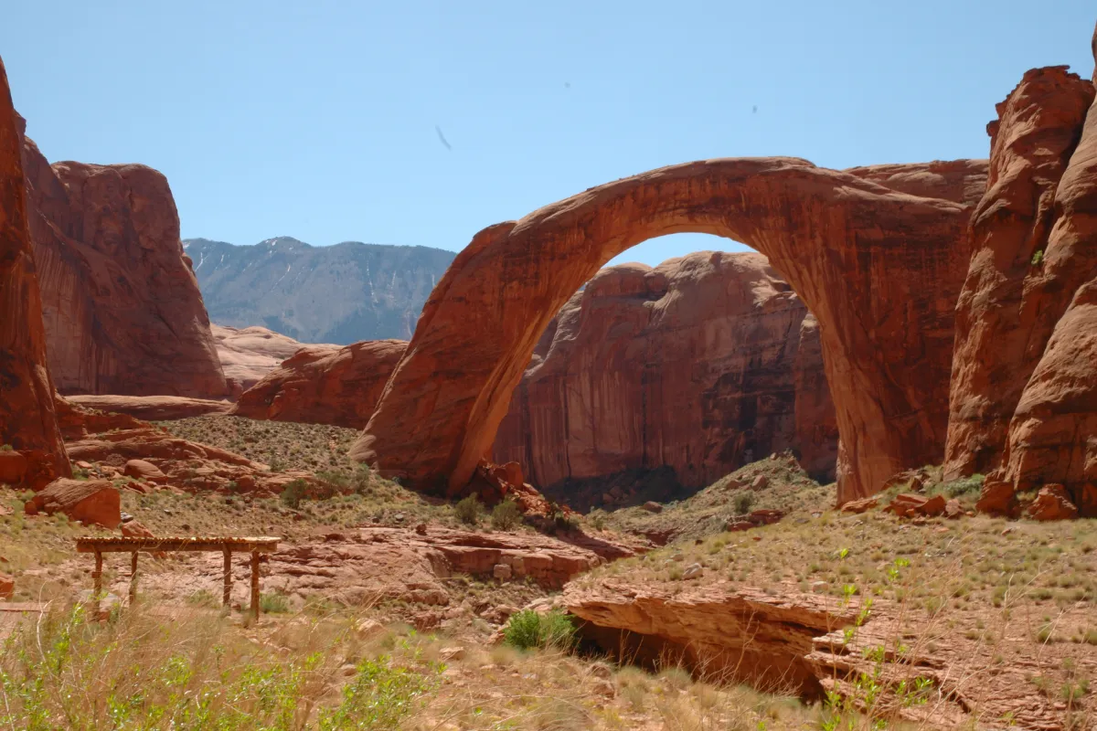 A large sandstone arch - a natural bridge.